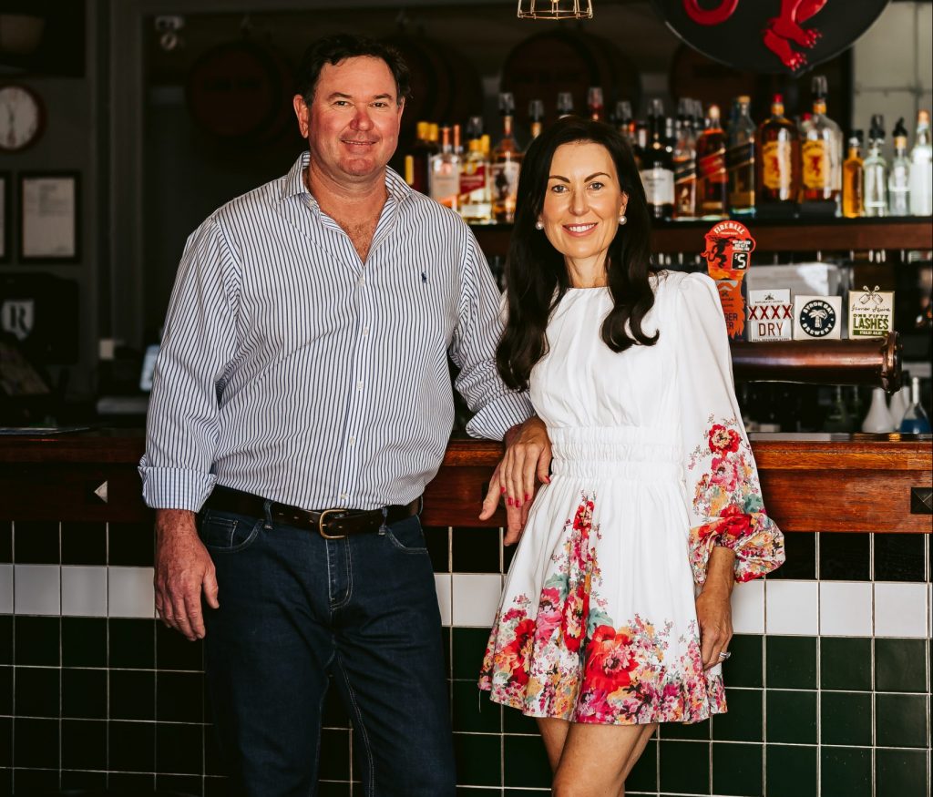 Noel and Jane Jesberg standing in newly renovated bar at The Rix Hotel, Charters Towers