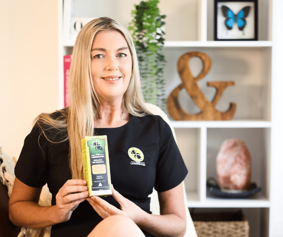 Kellie Crowhurst holding a box of The Licerator