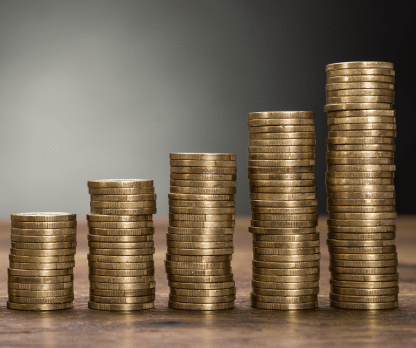 Stacks of gold coins increasig in height