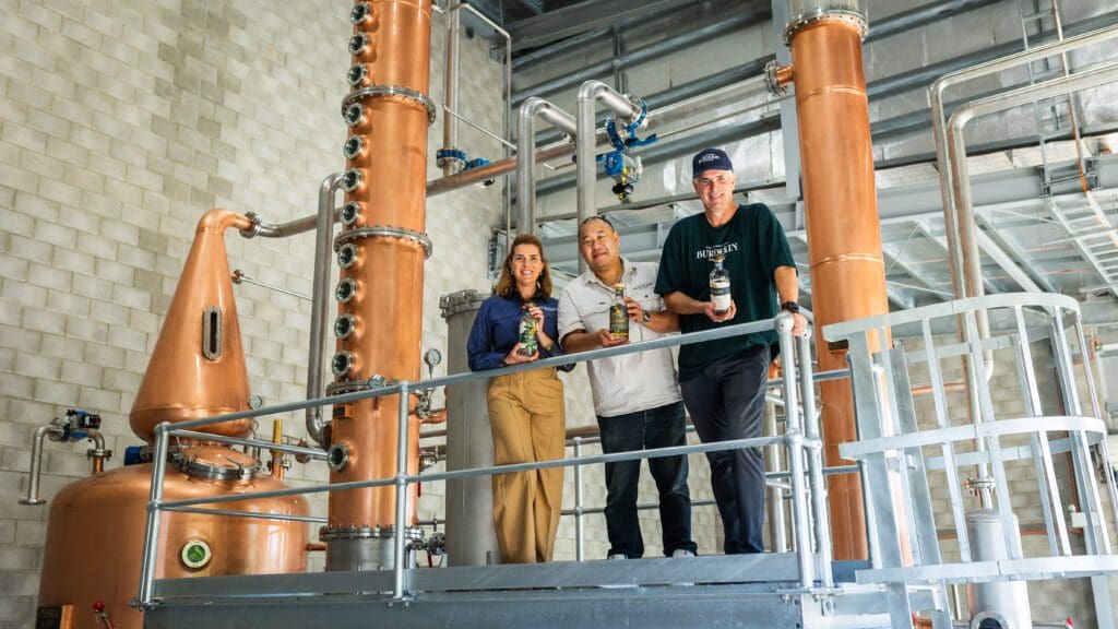 Burdekin Rum founders Sophie Duggan and Anthony Duggan with head distiller Jason Chan. BDmag 2024
