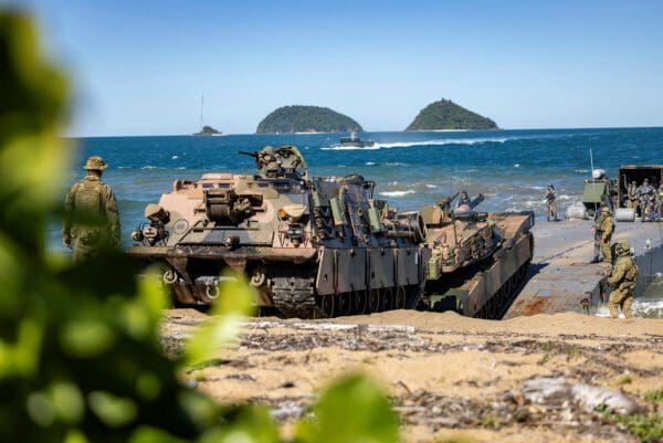 Members of the Australian Amphibious Force conduct an M1A1 Abrams tank recovery exercise during Wet and Dry Environment Rehearsals at Cowley Beach Training Area.